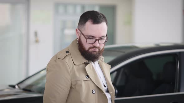 Serious Adult Man Buys a New Car alt