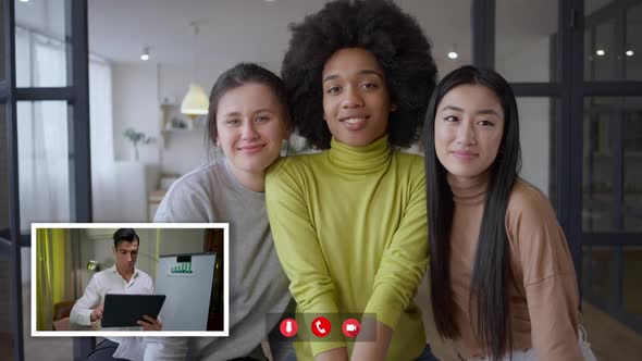 Team of Young Cheerful Multiethnic Women Looking at Webcamera As Confident Concentrated Man in Web alt