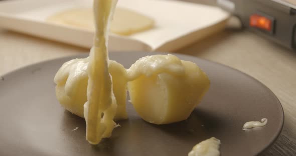 Raclette swiss and french meal, 4K slow motion
