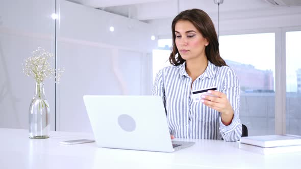 Upset Hispanic Woman after Failed Online Shopping, Payment by Credit Card alt