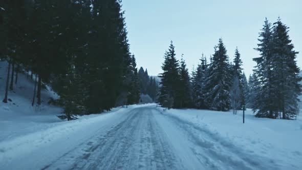 Driving through winter landscape, Karwendel, Bavaria, Germany alt