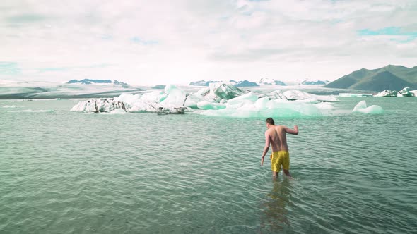 Man Ice Bathing in a Glacier Lagoon, Stock Footage | VideoHive