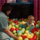 Mom Throws Colorful Balls Playing with Little Son in Pool - VideoHive Item for Sale