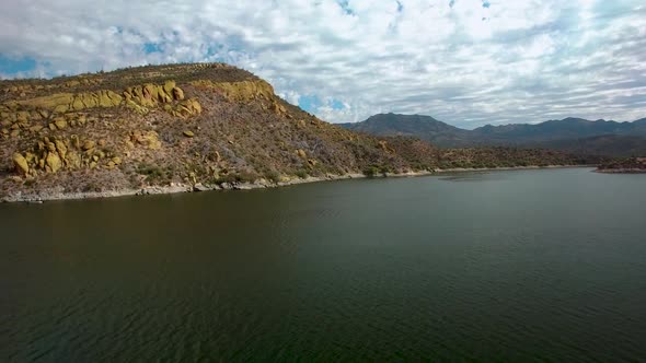 Saffron Cliffs drone footage tilt up alt