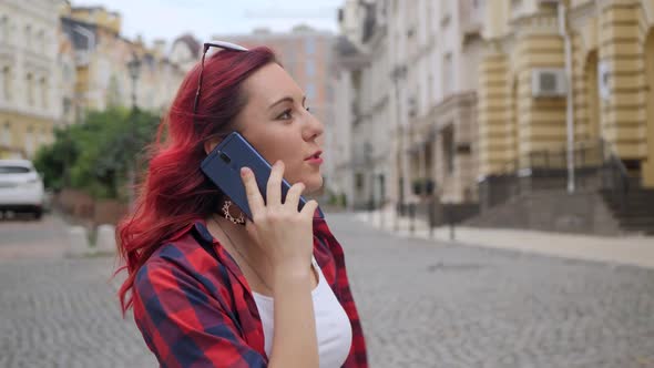 Red Hair Girl Speaks Phone