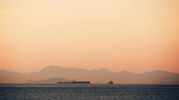 Sea Gibraltar Strait With Cargo Ships In Roadstead. alt