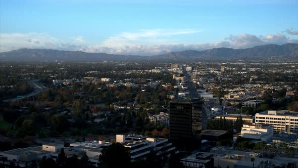 Time Lapse of Clouds Rolling Over Mountains and City, Afternoon Becomes Evening in Burbank, Blue Sky alt