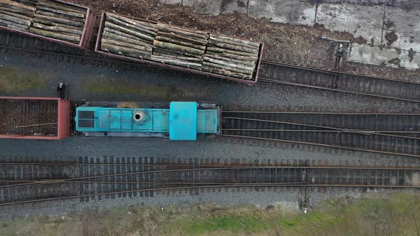 railway wagons loaded with logs top view.