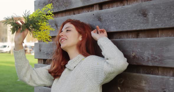 Women's Day with Girl and Yellow Mimosa in Italy alt