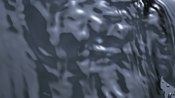 Super Slow Motion Shot of Silver Water Wave From Top Shot at 1000Fps alt