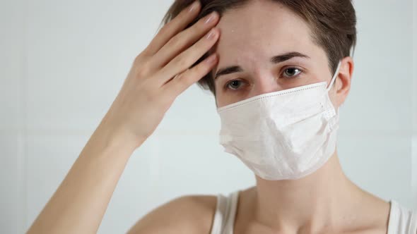 Woman with Symptoms of Coronavirus alt