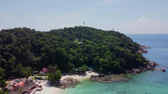 Aerial View of Topical Modern Resort with Green Palm Trees and Swimming Pool alt
