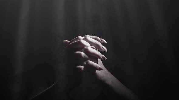 Woman Praying Folded Her Hands in Prayer