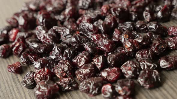 Healthy dehydrated  cranberries on table shallow DOF 4K 2160p 30fps UltraHD   footage - Red dried be alt