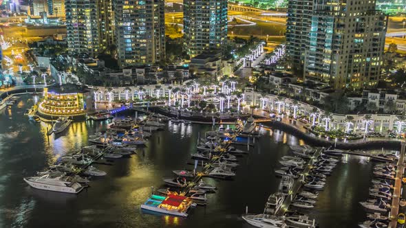 Beautiful Aerial Top View at Night Timelapse of Dubai Marina in Dubai UAE alt