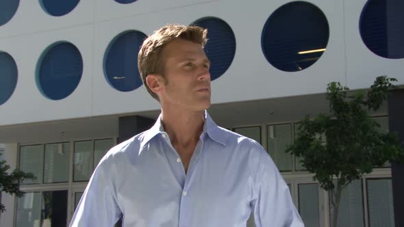 Portrait of male turning his head slowly to camera alt