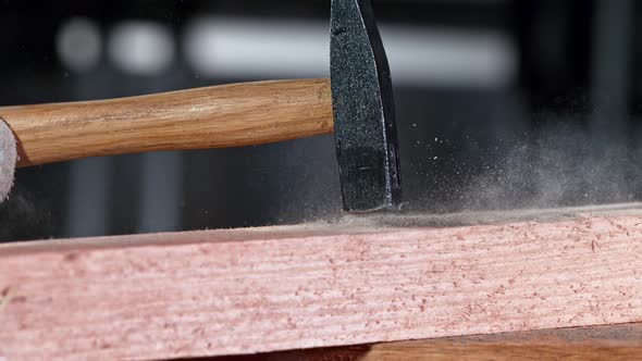 Supper Slow Motion Shot of Hammering a Nail at 1000 Fps alt