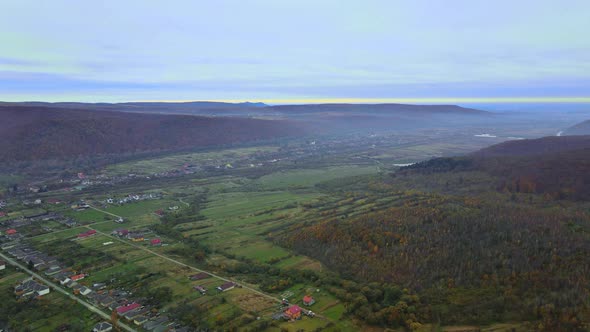 Landscape From a Height of a Village From a Height Top View with Fields alt