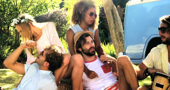 Group of hipster friend having fun and playing music alt