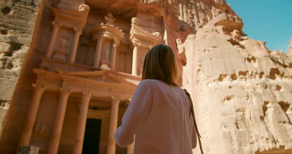 Female Traveler Takes Picture of Petra Temple Treasury in Jordan Middle East