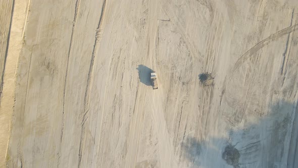 Aerial View of Open Pit Mining Site of Limestone Materials Extraction for Construction Industry with alt
