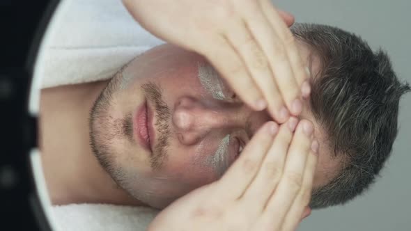 Confident Man Skin Treatment Moisturizing Vertical alt