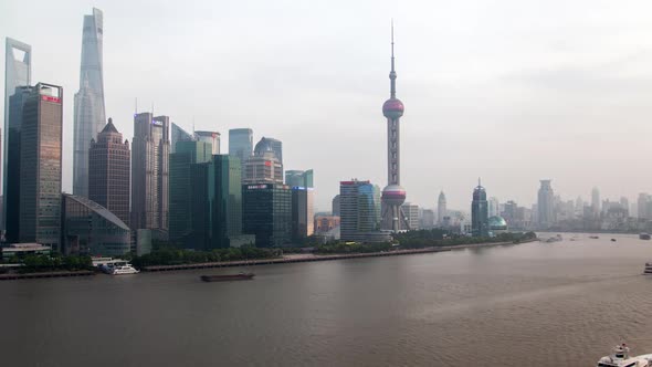Shanghai Vessels Sail Along Huangpu River in China Timelapse alt
