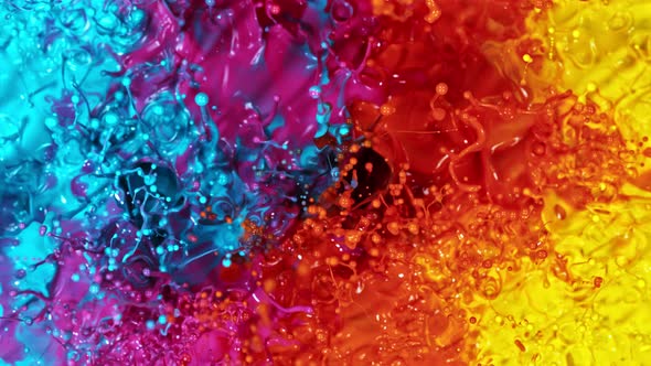 Super Slow Motion Shot of Abstract Splashing Colors at 1000 Fps, Top Shot. alt