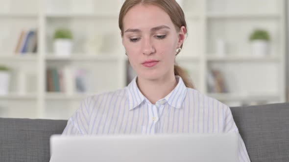 Portrait of Hardworking Young Woman Working on Laptop alt