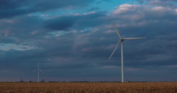 Timelapse of a power farm wind turbine. Windmill, Green Energy.  alt