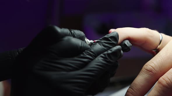 Hardware Manicure - Master Cleans the Nail Out of Cuticle Using a Small Nail Grinder alt