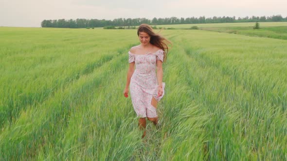 Girl in a White Dress in a Wheat Field at Sunset alt