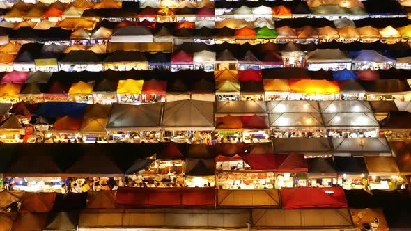 Illuminated Tents of Market at Night. Top View of Colorfull Brightly Illuminated Tents of Ratchada alt