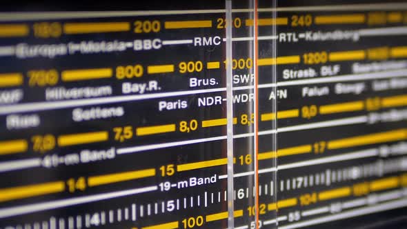 Tuning Analog Radio Dial Frequency on Scale of the Vintage Receiver alt