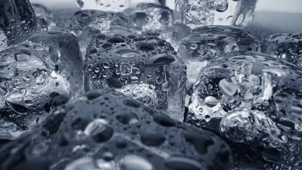 Wet Melted Ice Cubes with Waterdrops, Ice Super Macro, Slider Shot alt