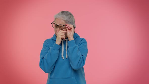 Disappointed Upset Elderly Old Woman Wipes Tears and Cries From Despair Sad Because of Unfair Things alt