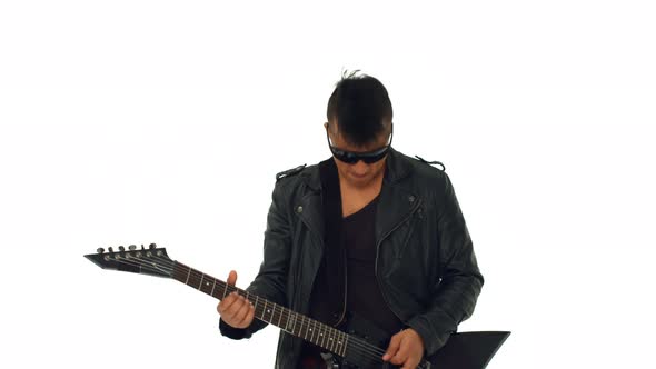 Passionate Young E Guitar Player on White alt