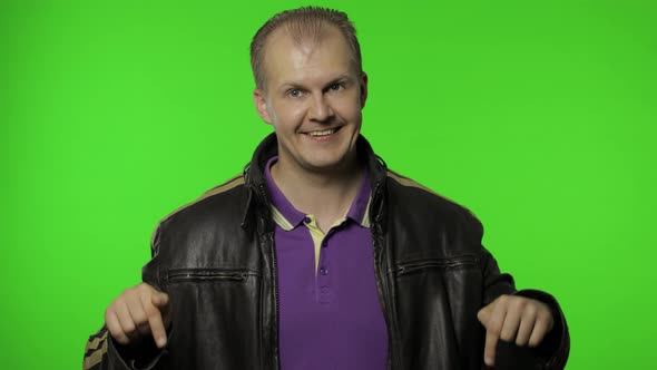 Man Rocker Asking To Subscribe, Trying To Control, Pointing Fingers Down, Chroma Key Background alt