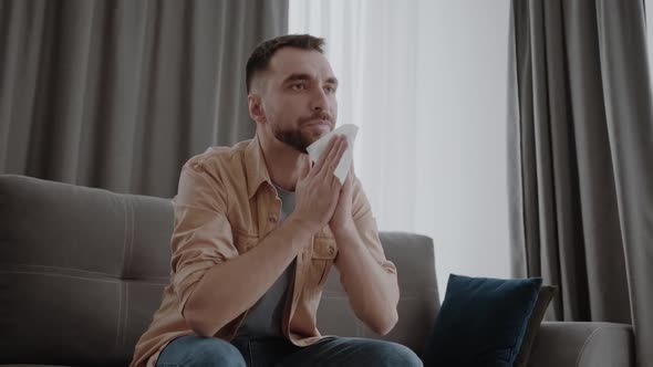 Ill Young Man Sneezing in Handkerchief Blowing Wiping Running Nose Sick Allergic Guy Caught Cold Got alt