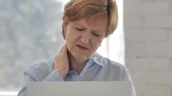 Neck Pain, Tired Old Woman Trying To Relax Body at Work alt