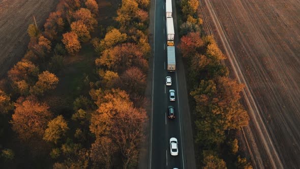 Aerial View of a Traffic Jam From Cars and Trucks on an Evening Suburban Road alt