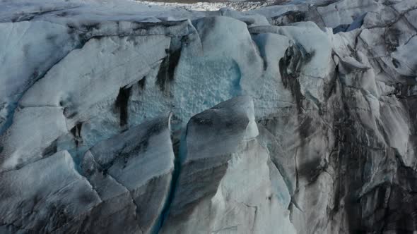 Close Up Drone View of Ice Blocks of Breidamerkurjokull Glacier in Iceland alt