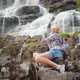Woman Photographs the Highest Waterfall in Norway - VideoHive Item for Sale