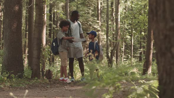 Father and Sons Got Lost in Forest while Camping alt
