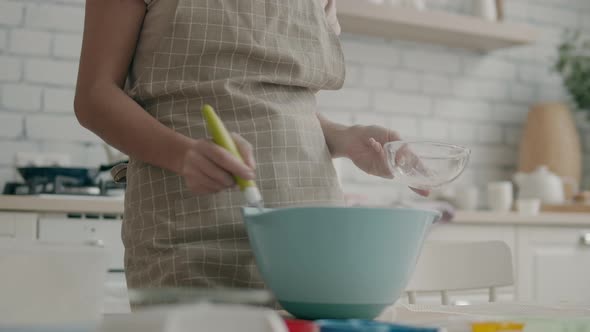 Woman in the Kitchen Cooking