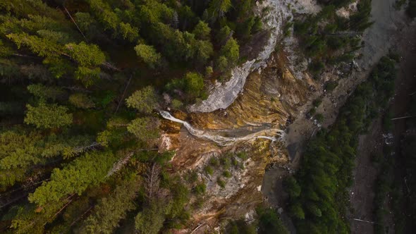 Waterfall in forest spining shot alt