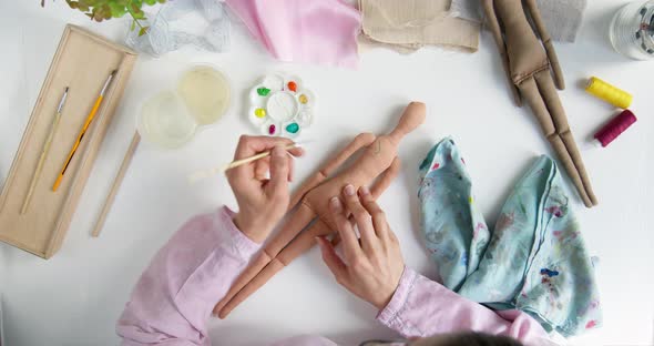 Designer artist painted a handmade textile doll. Needlework. Hobby. alt