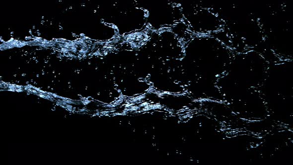 Super Slow Motion Shot of Twisting Water Splash at 1000Fps Isolated on Black Background alt