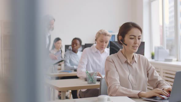 Diverse Female Operators in Call Center alt