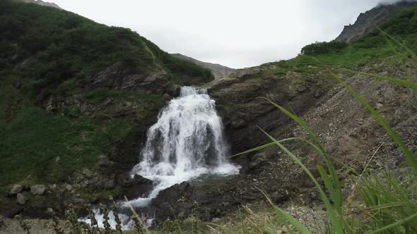 Summer view of cascade waterfall in mountains